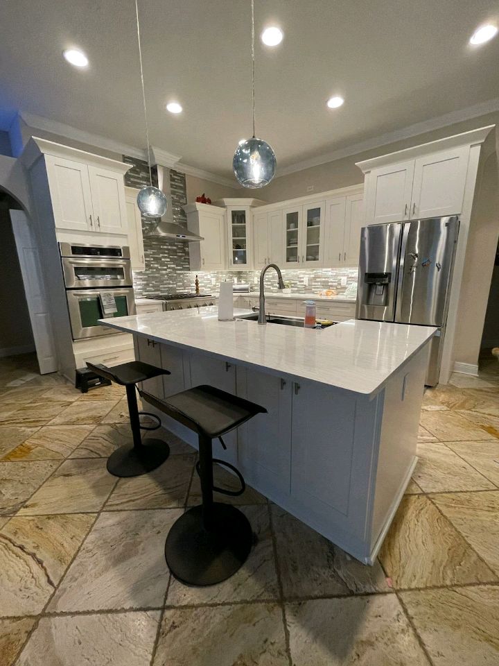 White shaker kitchen with modern lighting